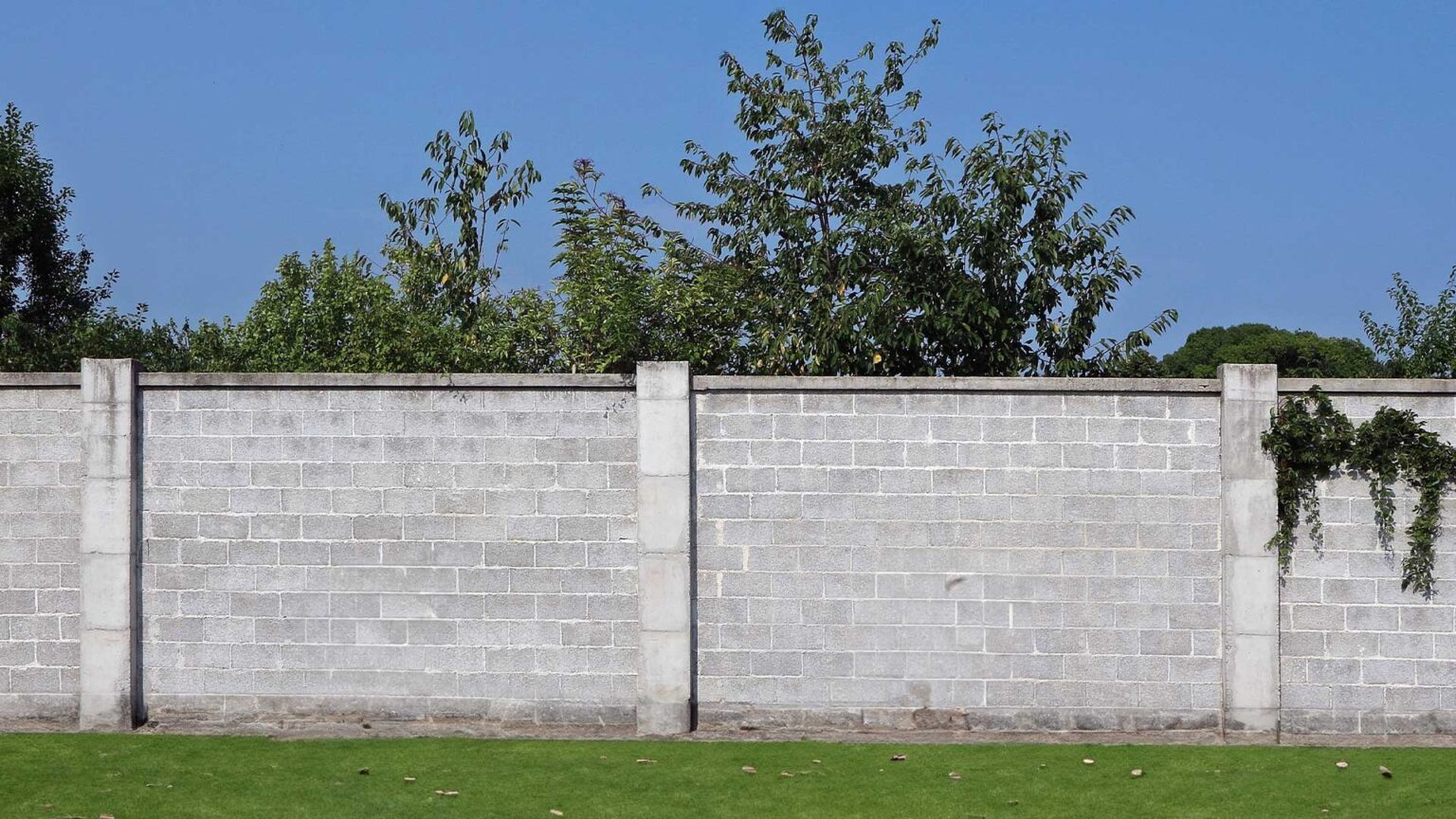 The no-thrills aesthetic of concrete block walls can look out of place without the right design context e.g. this looks like a prison wall!