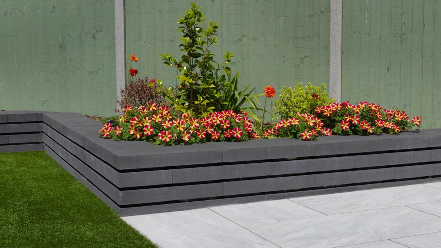 A raised bed made using Moodule Walling, a modular concrete walling landscaping system.