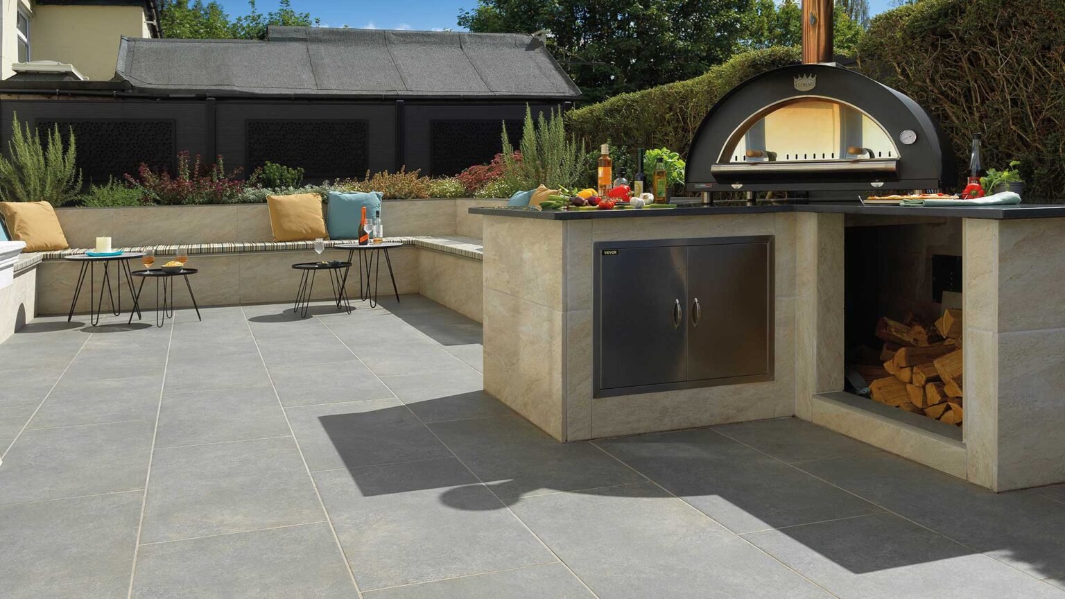 20 mm Dolomite Dust slabs have been used here to clad the outdoor kitchen and seating area carcase walls.